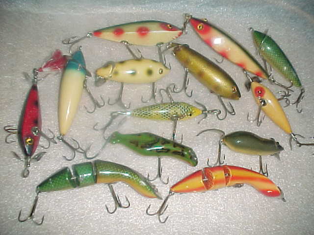 We buy antique fishing lures and lure boxes