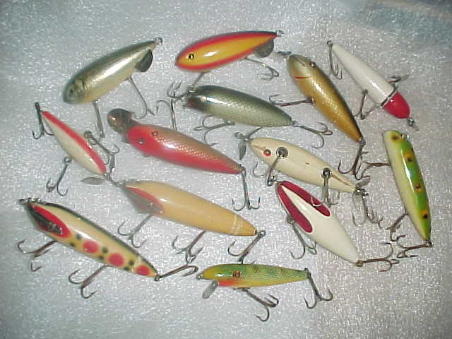 We buy antique fishing lures and lure boxes